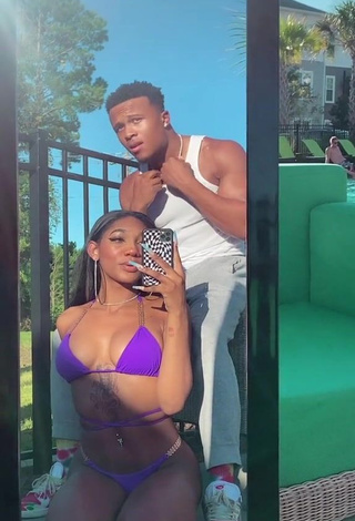 1. Erotic Bria Alana Shows Cleavage in Violet Bikini