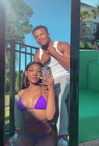 Erotic Bria Alana Shows Cleavage in Violet Bikini