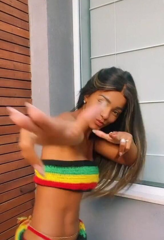 1. Irresistible Brunna Gonçalves in Striped Bikini Top