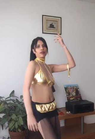 Erotic XENA in Golden Bikini Top and Bouncing Breasts