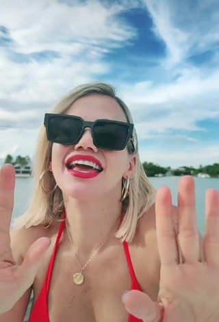 Irresistible Fanny Lu Shows Cleavage in Red Bikini Top on a Boat