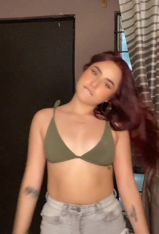 1. Irresistible Fernanda Duran in Olive Bikini Top