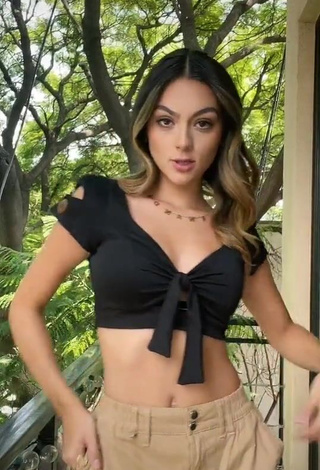 1. Irresistible Fernanda Rivas in Black Crop Top on the Balcony