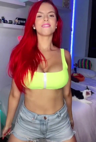 2. Irresistible Jenny Devil Shows Cleavage in Lime Green Crop Top