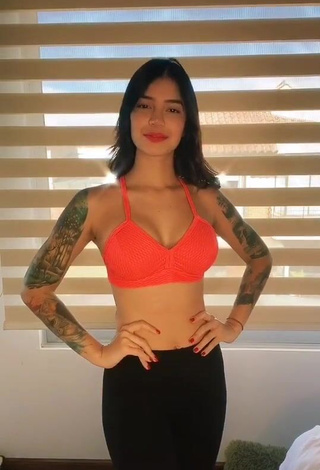 3. Beautiful Jenn Muriel Shows Cleavage in Sexy Orange Sport Bra and Bouncing Tits