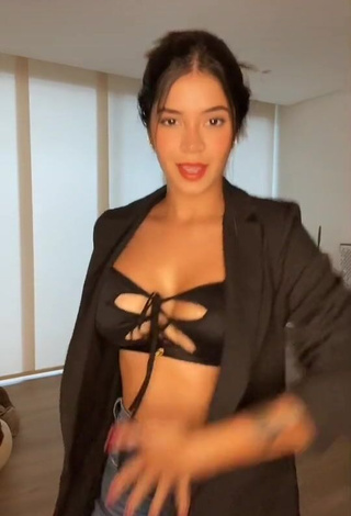 Beautiful Jenn Muriel Shows Cleavage in Sexy Black Crop Top