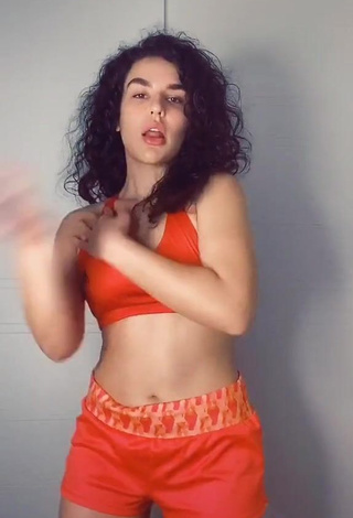 Irresistible Kefera Buchmann Shows Cleavage in Orange Sport Bra