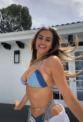 3. Irresistible Madi Webb Shows Cleavage in Blue Bikini Top