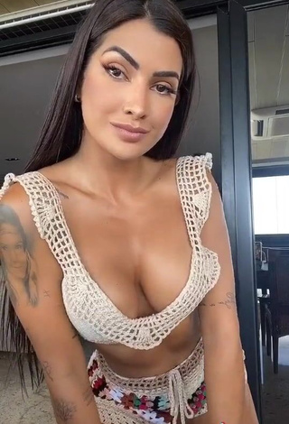 1. Irresistible Marina Ferrari Shows Cleavage in Beige Bikini Top