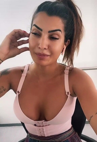 1. Captivating Marina Ferrari Shows Cleavage in Pink Crop Top