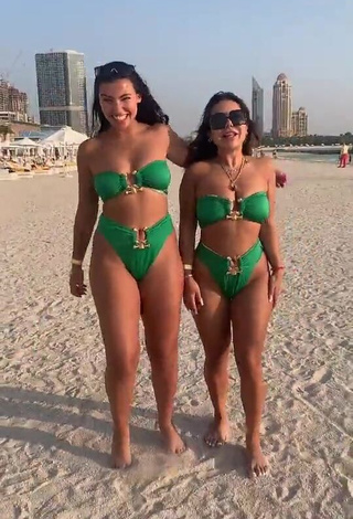 1. Erotic Nourhène Shows Cleavage in Green Bikini at the Beach