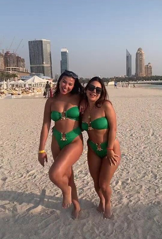 1. Captivating Nourhène in Green Bikini at the Beach