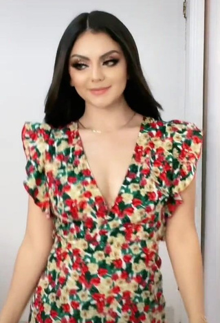 1. Erotic Melissa Navarro Shows Cleavage in Floral Dress