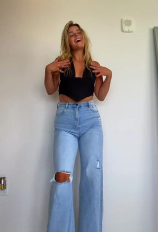 3. Irresistible Kayla Patterson Shows Cleavage in Black Crop Top