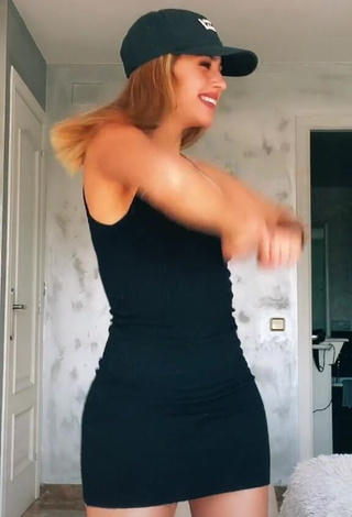 2. Erotic Victoria Caro Shows Cleavage in Black Dress