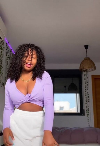 Sweetie Tania Fernández Shows Cleavage in Purple Crop Top