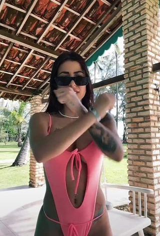 Irresistible Amanda Ferreira Shows Cleavage in Pink Swimsuit