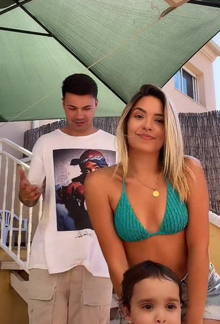 1. Cute Andrea Mengual Shows Cleavage in Green Bikini Top