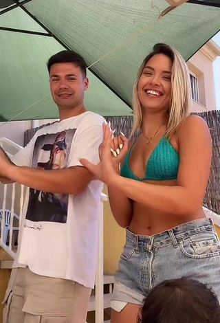 3. Cute Andrea Mengual Shows Cleavage in Green Bikini Top