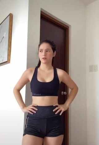 3. Erotic Barbie Imperial Shows Cleavage in Black Sport Bra