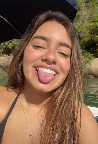 3. Beautiful Bela Almada Shows Cleavage in Sexy Bikini on a Boat and Bouncing Boobs