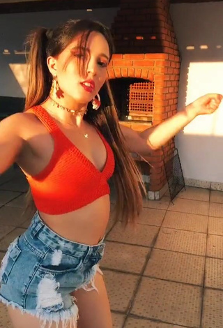 Erotic Bya Kessey Shows Cleavage in Red Crop Top