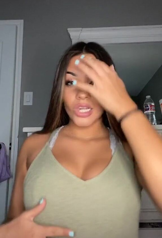 1. Erotic Camryn Cordova Shows Cleavage in Olive Top