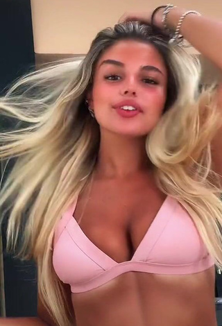 1. Hot Carla Frigo Shows Cleavage in Pink Bikini Top