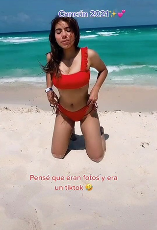 Erotic Valentina Shows Cleavage in Red Bikini at the Beach