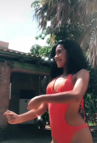 Erotic Dayana in Orange Swimsuit