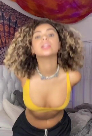 1. Erotic Devenity Perkins Shows Cleavage in Yellow Sport Bra and Bouncing Tits