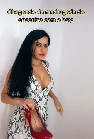 3. Cute Dine Azevedo Shows Cleavage in Snake Print Dress