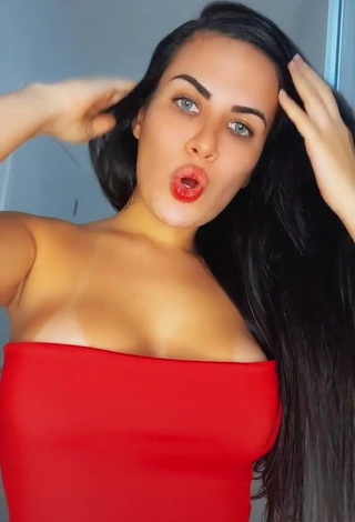 1. Sweetie Dine Azevedo Shows Cleavage in Red Top