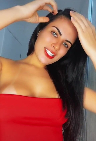 Sweetie Dine Azevedo Shows Cleavage in Red Top