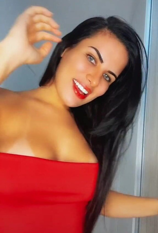 3. Sweetie Dine Azevedo Shows Cleavage in Red Top