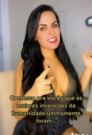 2. Erotic Dine Azevedo Shows Cleavage in Top