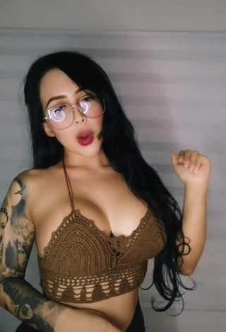 1. Eve Herrera Shows Cleavage in Sexy Brown Crop Top