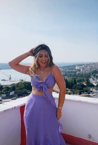 2. Erotic Gizemjelii in Purple Crop Top on the Balcony