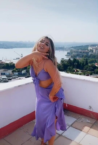 3. Erotic Gizemjelii in Purple Crop Top on the Balcony