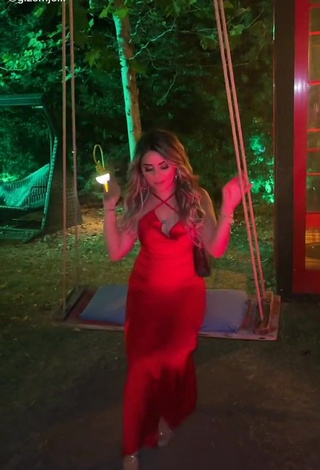 2. Erotic Gizemjelii in Red Dress