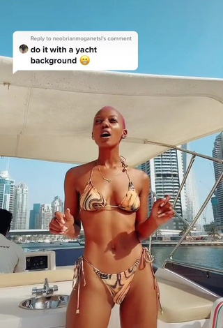 1. Seductive Vivian Gold Kaitetsi Shows Cleavage in Bikini on a Boat