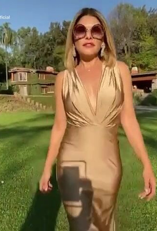 1. Erotic Tati Cantoral in Golden Dress