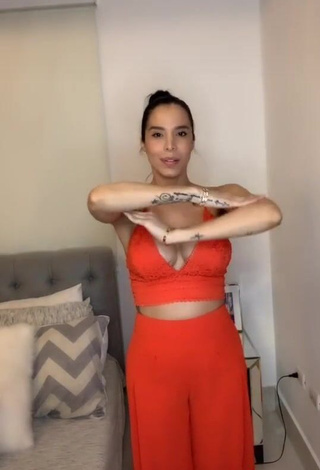 Sweet Jessi Pereira Shows Cleavage in Cute Orange Crop Top