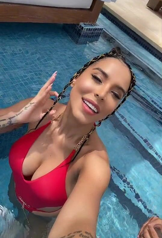 1. Erotic Jessi Pereira Shows Cleavage in Red Swimsuit at the Pool