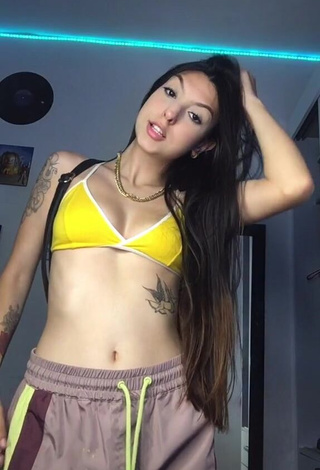 1. Julia Guerra Looks Alluring in Yellow Bikini Top