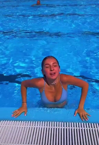 3. Erotic Lera Kantur Shows Cleavage in Blue Bikini Top at the Swimming Pool