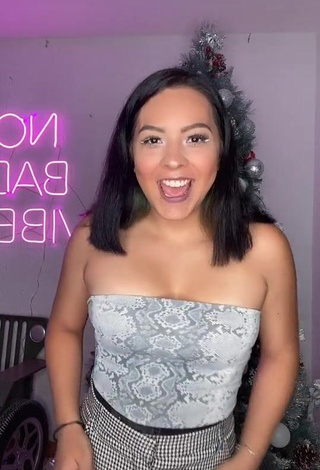 Erotic Karen Bustillos Shows Cleavage in Snake Print Tube Top and Bouncing Boobs