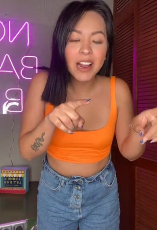 Irresistible Karen Bustillos in Orange Crop Top