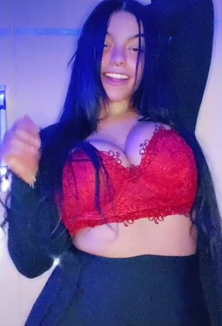 Karniello Shows Cleavage in Sexy Red Bra