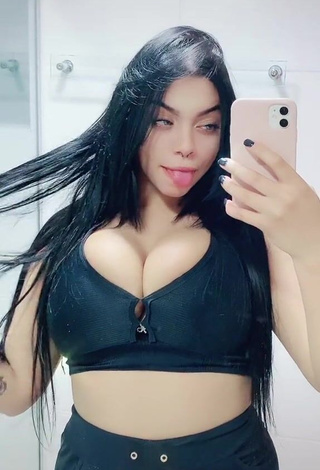 Alluring Karniello Shows Cleavage in Erotic Black Bra